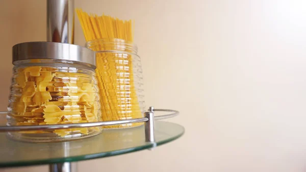 Pasta in a glass jar. Free space for text Royalty Free Stock Photos