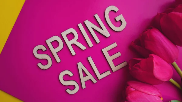 Spring sale banner with pink tulips — Stock Photo, Image