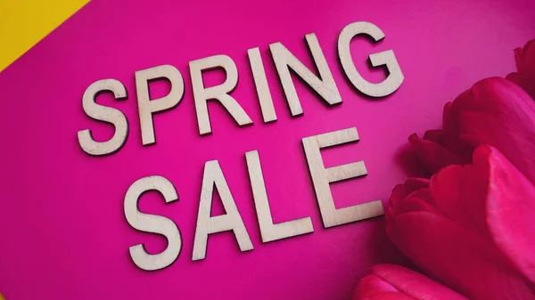 Spring sale banner with pink tulips — Stock Photo, Image