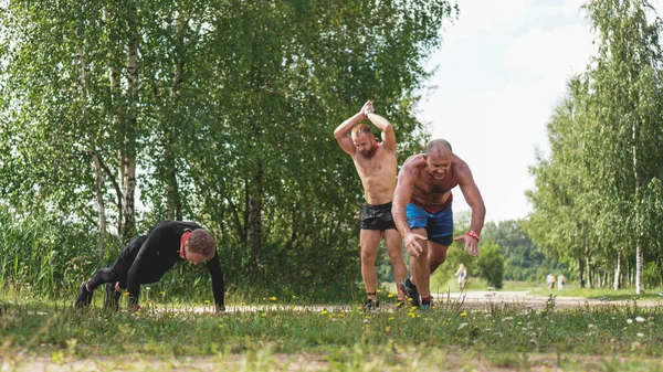 Minsk, Bularus. July 28, 2019. Sport competitions, forest. Men of different age — Stock Photo, Image