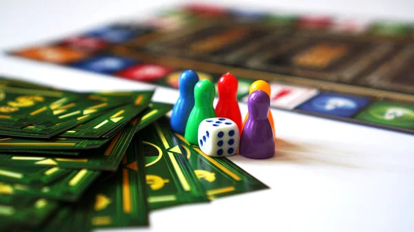 Board game Monopoly with money and plastic chips. No logos or visible brands — Stock Photo, Image