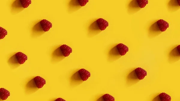 Рядки малини на жовтому тлі — стокове фото