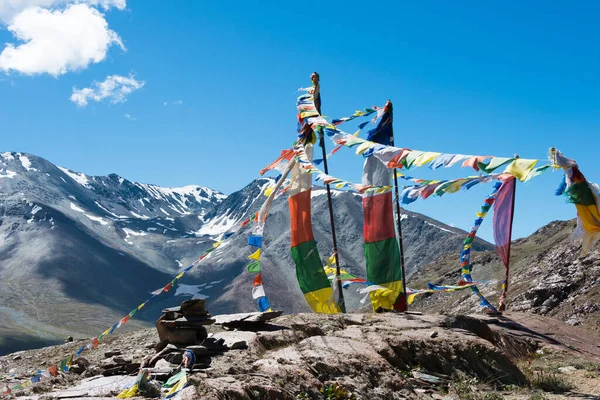 Himachal Pradesh, India - Tibetan Prayer Flag at Kunzum Pass (Kunzum La) - Chandra Taal (Moon Lake) Trekking course in Lahaul and Spiti, Himachal Pradesh, India.