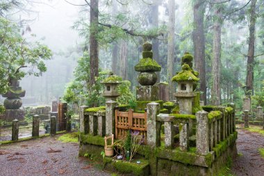 Wakayama, Japan - Tomb of Takeda Shingen and Takeda Katsuyori at Okunoin Cemetery in Koya, Wakayama, Japan. Mount Koya is UNESCO World Heritage Site. clipart