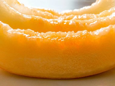 Arka plan olarak lezzetli bal kavun parçaları