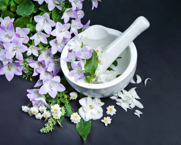 Spa background with flowers. Hygiene items for bath and spa.