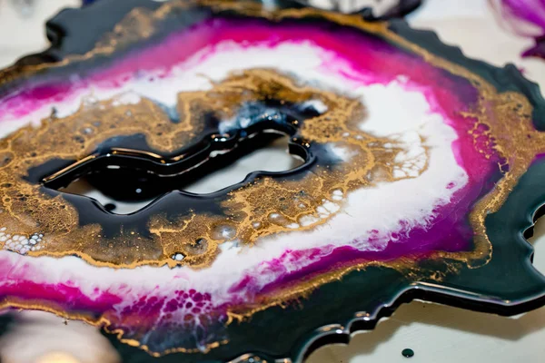 Epoxy resin art. Abstract composition for your design. Macro photo