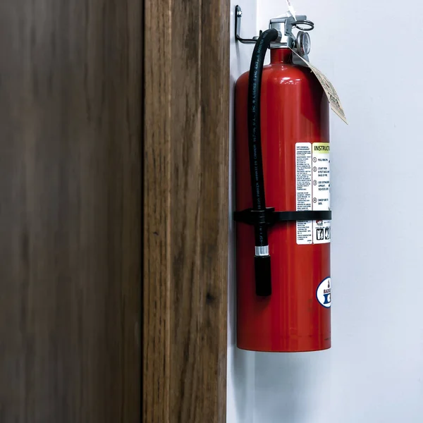 close up view of a fire extinguisher for commercial or home use