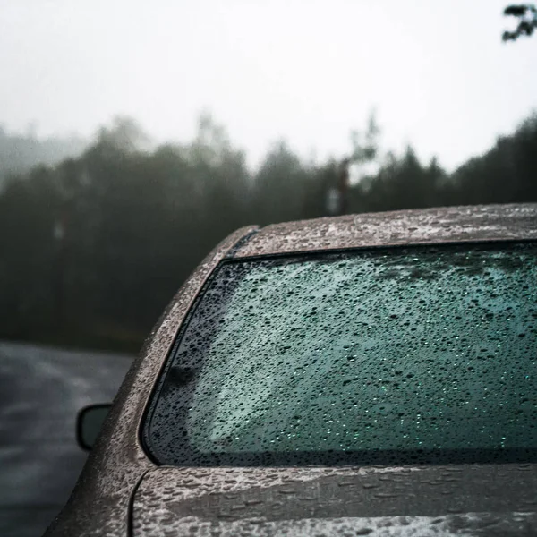wet car rear window