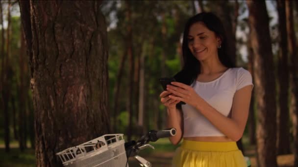 Young woman looks happy to receive good news — Stock Video