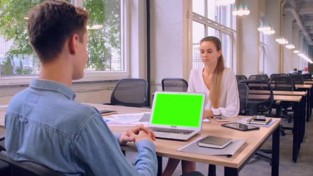 Young Man and Smiling Girl are Talking at Cafe Indoor — Stock Video