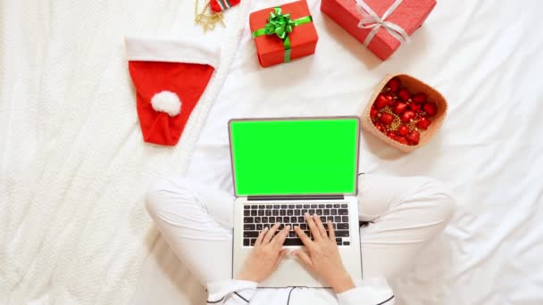 Women hands with computer christmas time at home — Stock Video