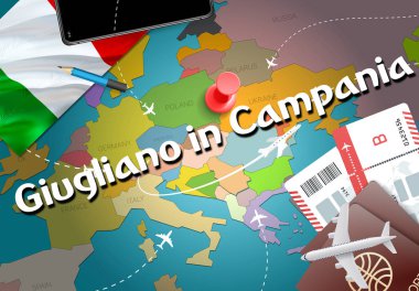 Giugliano Campania şehir seyahat ve Turizm hedef kavram. İtalya bayrağı ve Giugliano in Campania şehir haritası üzerindeki. İtalya kavramı harita arka plan seyahat. Uçak ve Campania tatil İtalyan vacatio Giugliano için uçuş biletleri