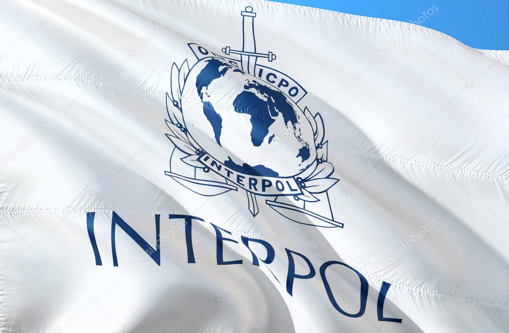 Interpol flag waving in the wind, 3D rendering. Interpol Europe. Europe Secret Service. Central Intelligence Agency. Security Service and international intelligence- Moscow, 1 January 201