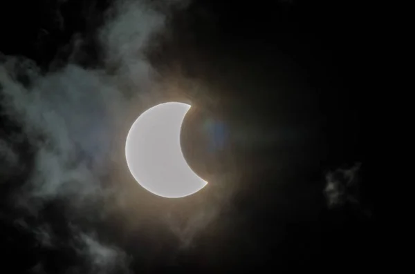 Partial Solar Eclipse on a Cloudy Day