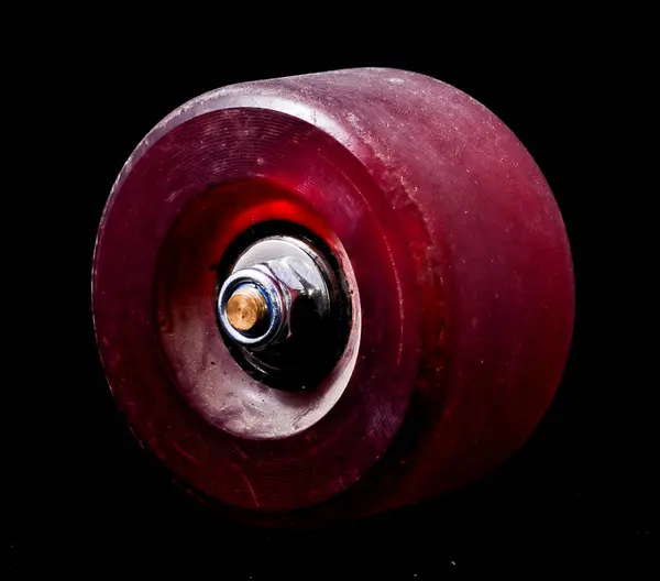 Old Vintage Consumed Skate Wheel Black Background — Stock Photo, Image