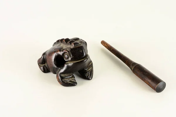 Typical vintage Oriental wooden frog musical instrument souvenir