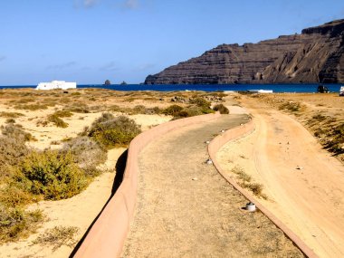 Spanish View Landscape in La Graciosa Lanzarote Tropical Volcanic Canary Islands Spain clipart