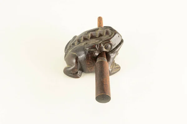 Typical vintage Oriental wooden frog musical instrument souvenir
