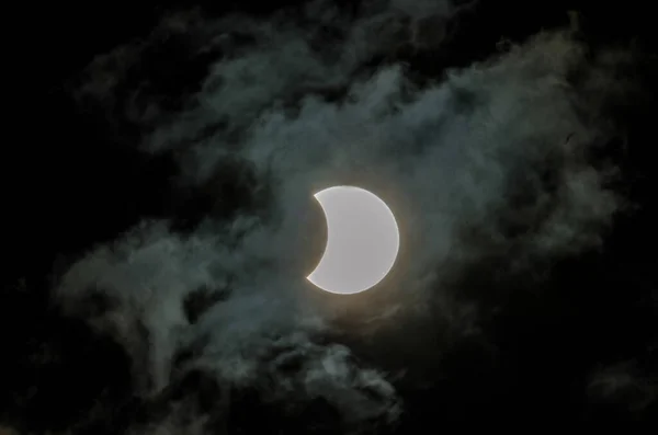 Partial Solar Eclipse on a Cloudy Day