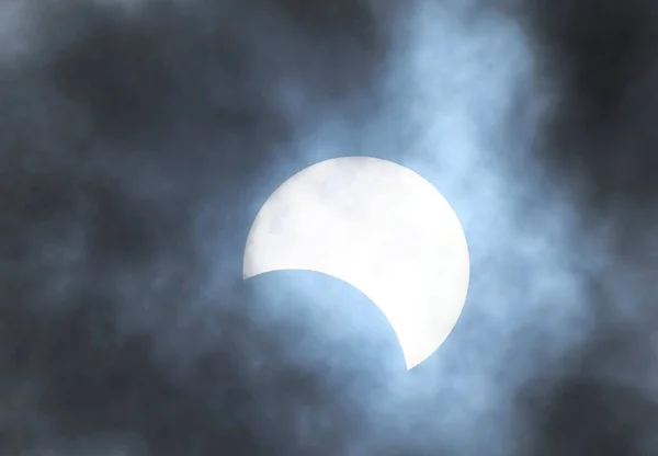 Partial Solar Eclipse on a Cloudy Day 03.11.2013