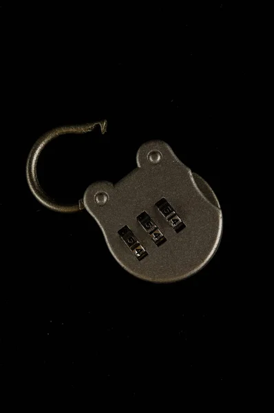 Close-up of combination lock Object on a black Background