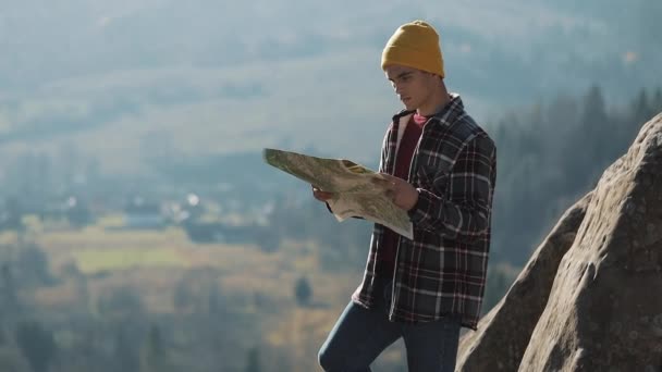 Travelling Mountains Hiker Man Holds Old Map Standing Top Rock Stock Footage