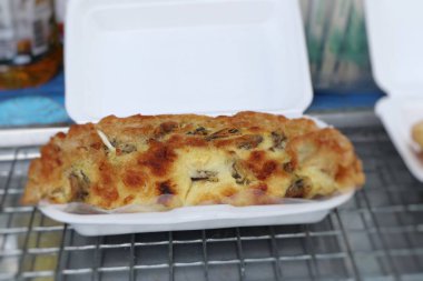 Yumurta ile çıtır çıtır kızarmış midye