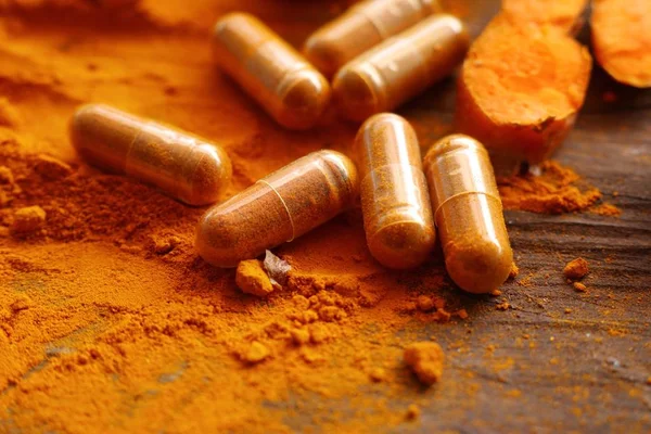 Turmeric capsule with powder