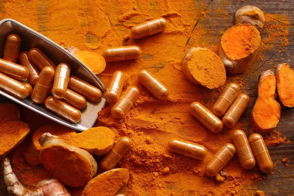 Turmeric capsule with powder