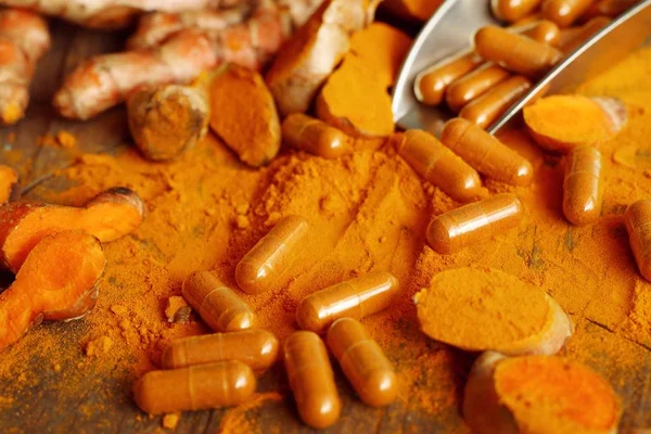 Turmeric capsule with powder