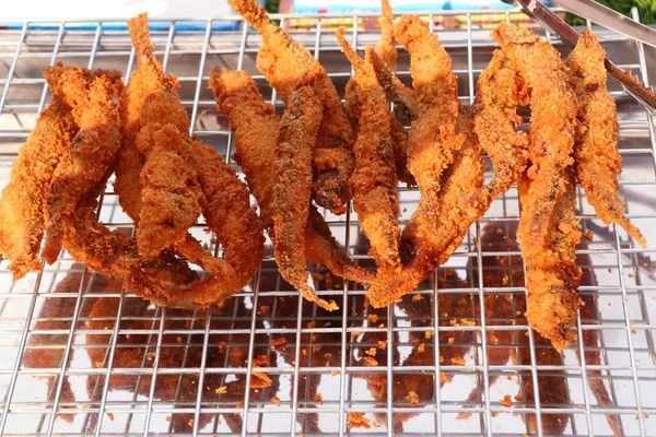 Fried fish at street food — Stock Photo, Image