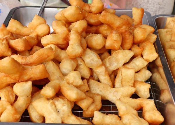 Deep-fried dough stick at market