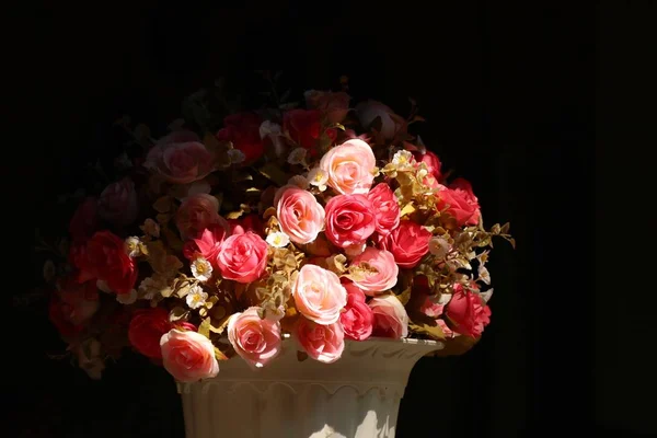 Beautiful artificial pink roses vase