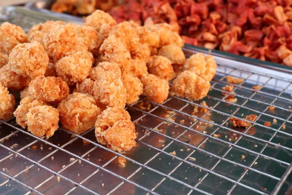 Pepitas fritas em comida de rua — Fotografia de Stock