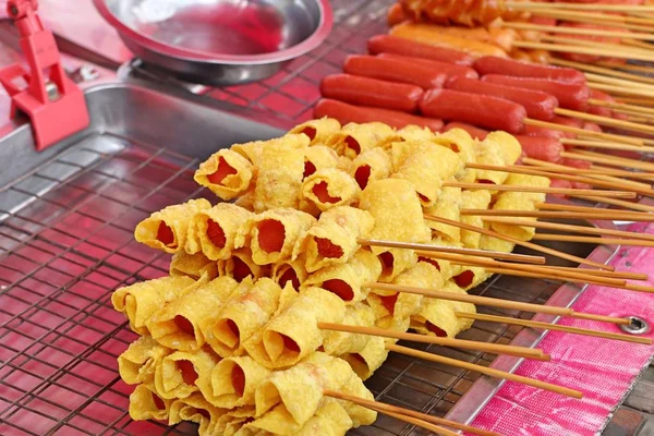 Fried sausage at street food — Stock Photo, Image