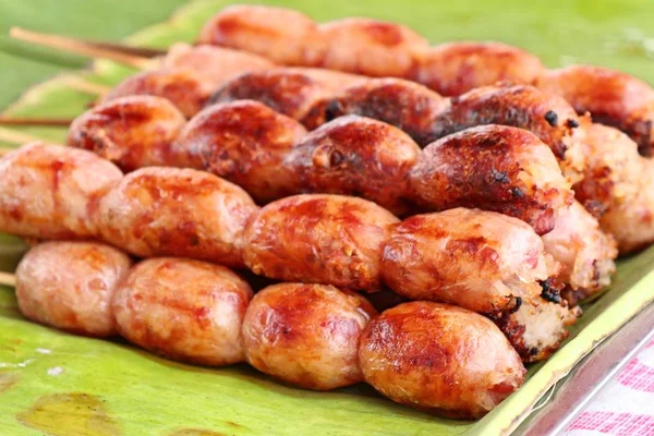 Grilled sausages at street food — Stock Photo, Image