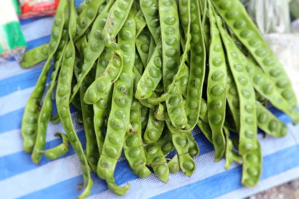 Bitter bean at the market — Stock Photo, Image