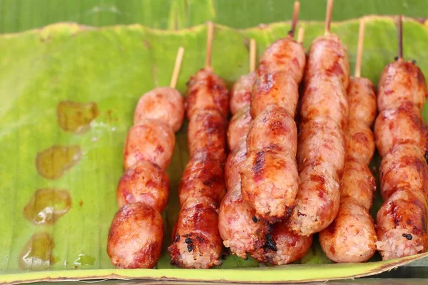 Grilled sausages at street food — Stock Photo, Image