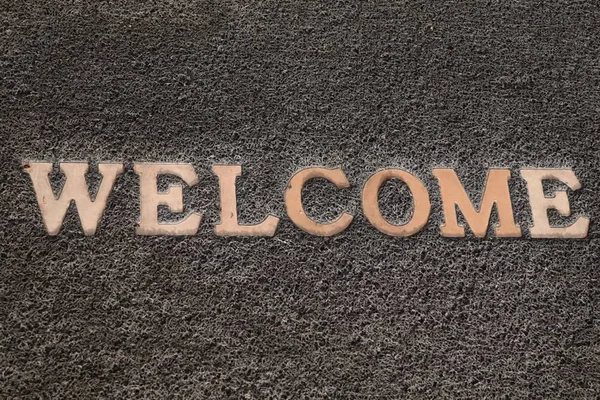 Background carpet sign in welcome — Stock Photo, Image