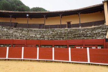 stands and burladero of the La Antigua bullring, in Bejar, Salamanca, Castilla Leon, Spain. Europe. old construction. clipart