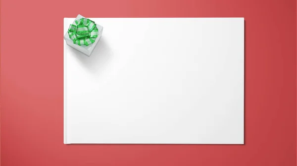 在红色背景的白纸上带有绿色丝带的礼品盒 — 图库照片
