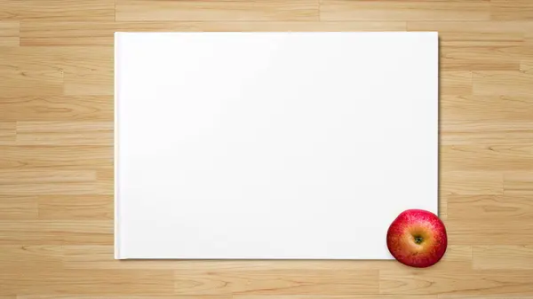 Roter Apfel Auf Weißem Papier Auf Hölzernem Hintergrund — Stockfoto