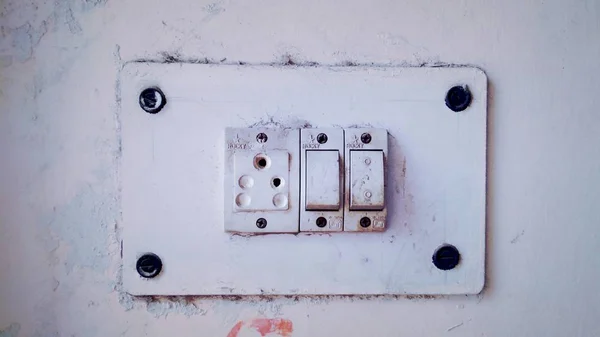 Old Plug Socket Board Old White Wall Royalty Free Stock Images