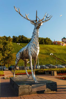 Nizhny Novgorod, Russia-May 5, 2018: Metalic sculpture, Deer, symbol of Nizhny Novgorod. Sculpture was presented to city by Honorary Consul as token of friendship between Hungarian and Russian people clipart