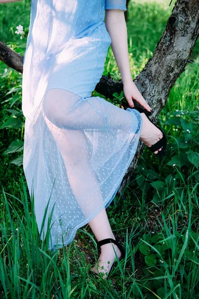 Calm Pretty Young Woman Garden Wearing Transparent Blue Dress Fixing — Stock Photo, Image