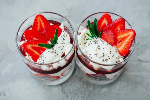 Sweet strawberry chia pudding dessert with cream and jelly