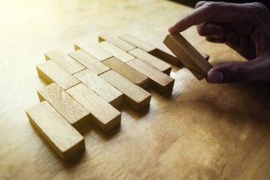 The way planning for business growth with wooden blocks