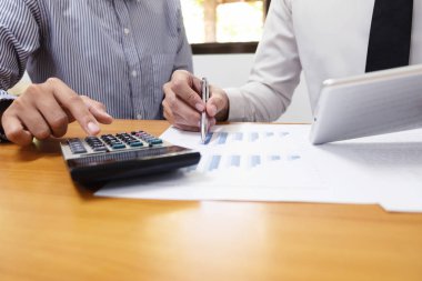 Two businessman are discussing about business growth and planing