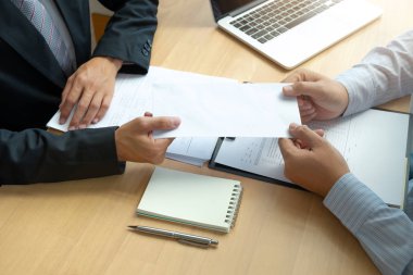 Boss received a letter of resignation from employee on the table